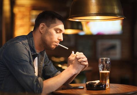 Premium Photo People Smoking And Bad Habits Concept Man Drinking