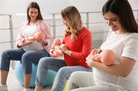Premium Photo Group Of Pregnant Women At Courses For Expectant Mothers Indoors
