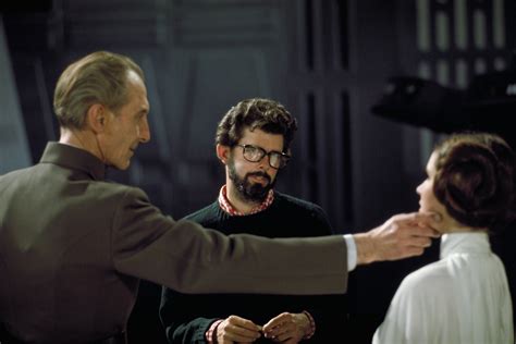 Peter Cushing George Lucas And Carrie Fisher On The Set Of Star Wars