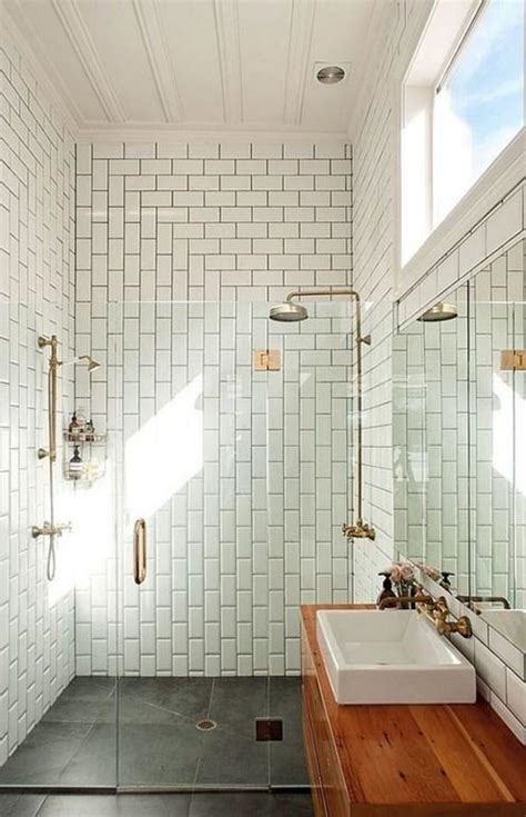 The use of soft grey marble in tiles and mosaic add the needed texture and interest make this small bathroom seem larger. Subway Tiles in 20 Contemporary Bathroom Design Ideas - Rilane