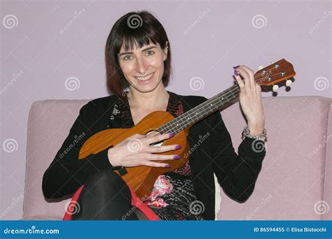 Beautiful Brunette Woman Playing Ukulele Stock Image Image Of Jazz