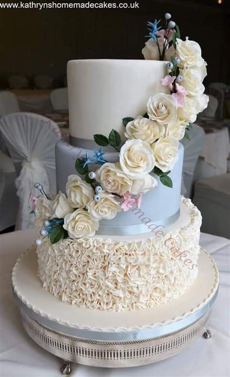 Ivory And Silver 3 Tier Wedding Cake Ruffled Bottom Tier And A Cascade