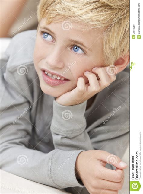 I know it's blonde hair like what kind of blonde like shade? Blond Hair Blue Eyes Boy Child Resting Stock Photo - Image ...