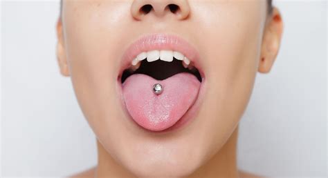 Love Tongue Piercings Heres What You Should Know Before