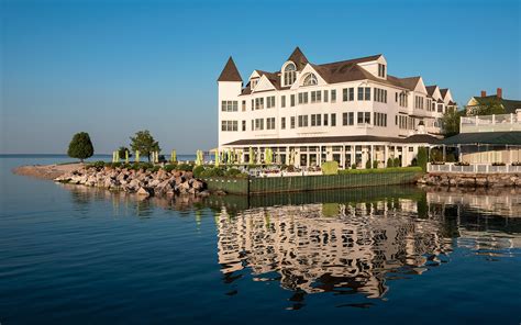 Elegant, waterfront hotel with room and suite accommodations, featuring inviting decor and an onsite restaurant. Mackinac Island Hotels | Official Website | Hotel Iroquois