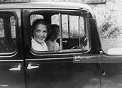 Diana Beaumont at the wheel of her car with fellow actress Ursula ...