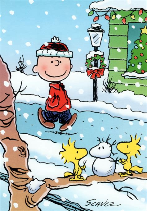 Charlie Brown Walking In The Snow During The Christmas Season Peanuts