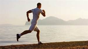 Do You Know What it Means to Engage Your Core? -- man running on beach