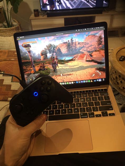 Playing A Playstation Game Hzd On An Apple Macbook With A Nintendo