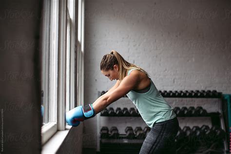 Strong Healthy Woman Working Out In Gym Boxing By Stocksy