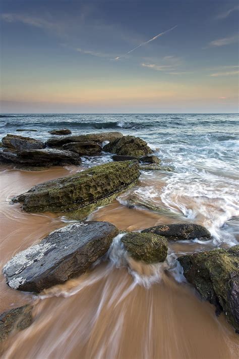 Sea Stones Beach Horizon Tide Hd Phone Wallpaper Peakpx