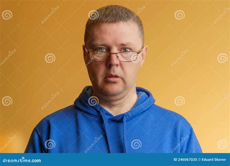 Portrait Of A Surprised Man In Glasses European In Blue Hoodie And Glasses Stock Image Image