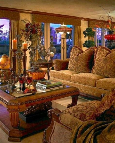 A Living Room Filled With Lots Of Furniture And Windows Covered In