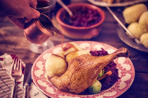 Traditional christmas foods saving the best for last, one of the most anticipated german christmas traditions is the christmas dinner! Traditional German Holiday Goose Dinner With Dumplings And Red Cabbage Stock Photo - Download ...