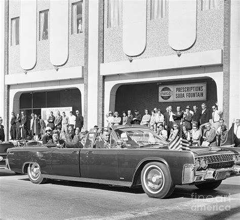 President Kennedy Riding In Convertible Photograph By Bettmann Fine