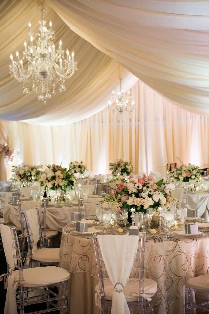 Ivory Draped Tent With Fabulous Linens And Hanging