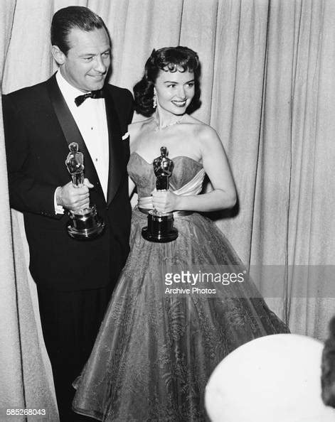 Actress Donna Reed Holding Her Oscar For The Film From Here To News