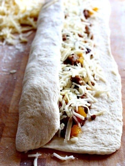 I will dig deep into my fridge and cupboards and get very creative. Sausage and Pepper Stuffed Bread - Mantitlement