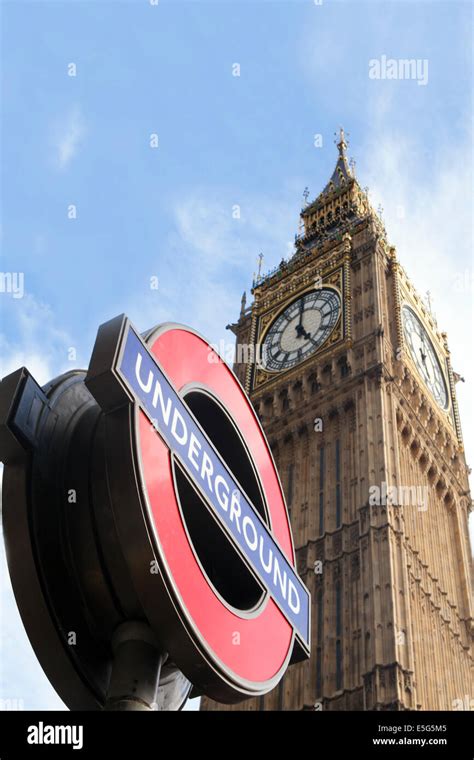 An Underground Rail Sign And The Queen Elizabeths Tower Big Ben In