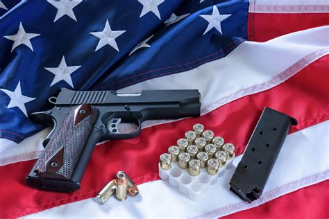 The Second Amendment And Gun Control In The Us Concept A Handgun A