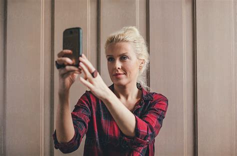 Blonde Woman Taking A Selfie By Stocksy Contributor Lumina Stocksy