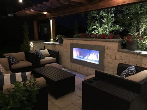 Contemporary Outdoor Room With Fireplace Includes A Pergola Led