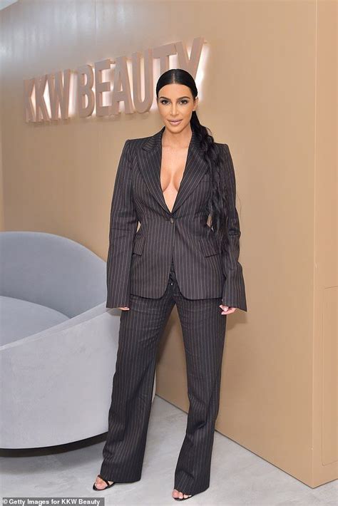 Kim Kardashian Puts Her Chest On Display As She Goes Shirt Free Kim