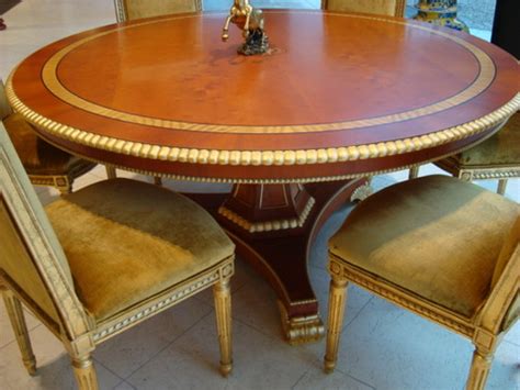 Maybe you would like to learn more about one of these? Ex Display Clive Christian Dining Table in Yew & Gold