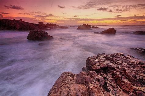 Body Of Water And Rock Formation During Orange Sunset Hd Wallpaper