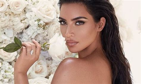 Kim Kardashian Poses Topless While Flashing A Diamond Ring As She Promotes New Makeup Line