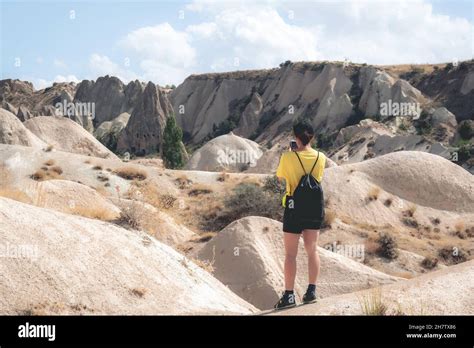Woman Photographing Landscape In Cappadocia Turkey Stock Photo Alamy