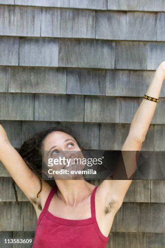 Woman With Hairy Armpits High Res Stock Photo Getty Images