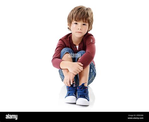 Where Is Everyone Studio Shot Of A Cute Little Boy Hugging His Knees