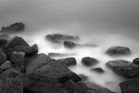 Mist And Ocean Waves Splashing On Rocks Image Free Stock Photo