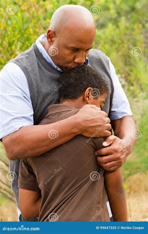 Father Comforting His Son Stock Photo Image Of Adult 99647320