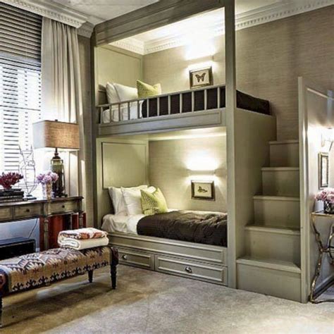 A Bedroom With Bunk Beds And Desks In Its Corner Along With Two Lamps