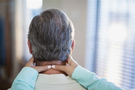 Close Up Of Female Therapist Massaging Neck To Male Patient Stock Image Image Of Indoors