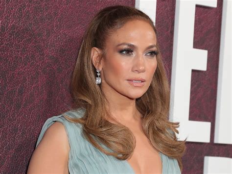 Jennifer Lopez Shows Glowing Skin In Plunging Neckline Photos
