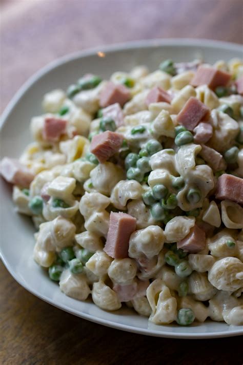 Before anything, cook the pasta according to package directions and reserve 1/2 cup of pasta cooking water for the sauce. Ham and Pea Pasta Salad | Or Whatever You Do