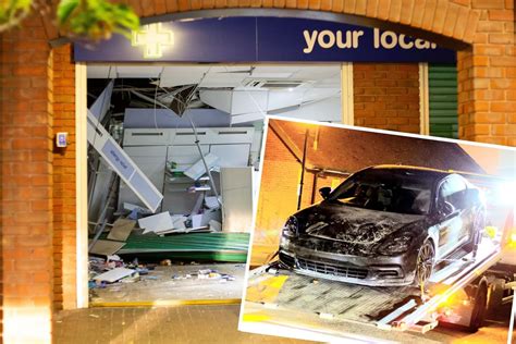 Mystery As £80000 Porsche Crashes Through Boots Window In Daventry