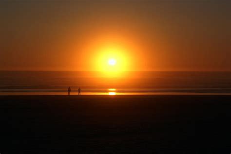 Sunsetting At Rockaway Beach Photograph By Ben Upham Iii