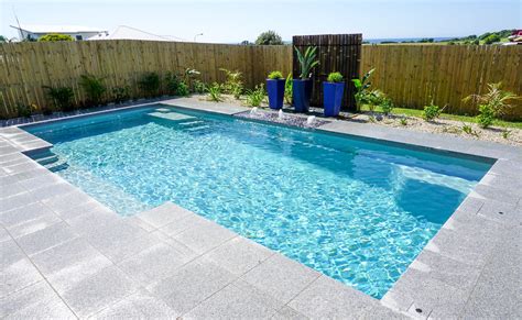 A Compass Pools Vogue Install In Quartz From The Bi Luminite Range Inground Pool Landscaping