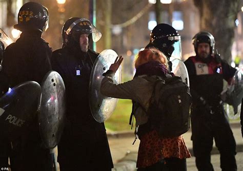 Riot Cops Are Confronted By Naked Protester During Another Night Of