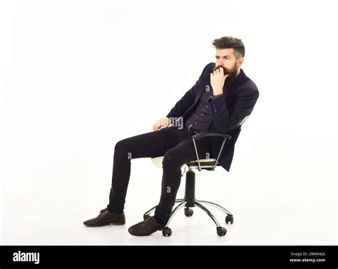 Business Man Sitting On Office Chair With Serious Face Isolated On