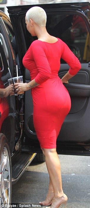 Amber Rose Shows Off Her Bombshell Curves In Fitted Red Frock As She Is Quizzed About Former