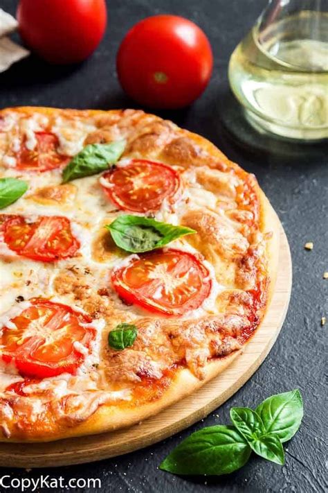 Bake the pizza for 10 to 15 minutes, or until the cheese is bubbly and the dough is nicely browned at the edges. How to make a Margherita Pizza | Recipe | Margarita pizza ...