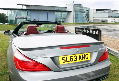 Motorized front license plate for with interface to control from key fob and steering wheel controls. SL 63 AMG Vanity Plate for Mercedes-Benz in the UK - autoevolution