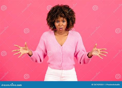 Shocked Confused Millennial African American Curly Female In Casual
