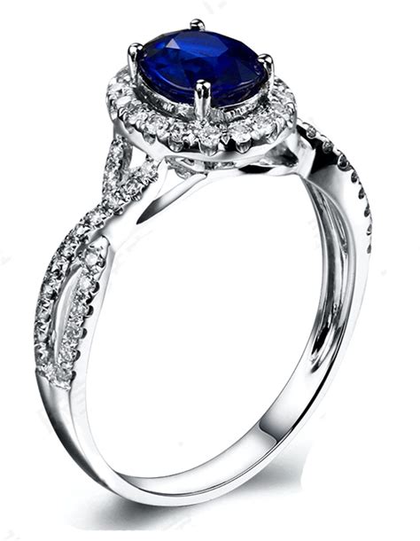 2 Carat Oval Cut Blue Sapphire And Diamond Halo Engagement Ring In