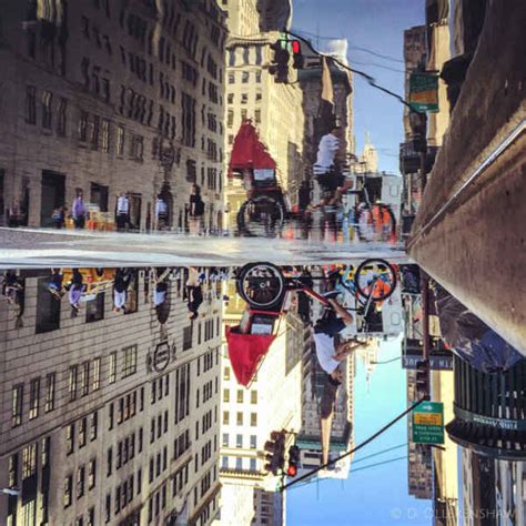 Photographer Captures The Amazing Reflections Of Puddles In New Yorks